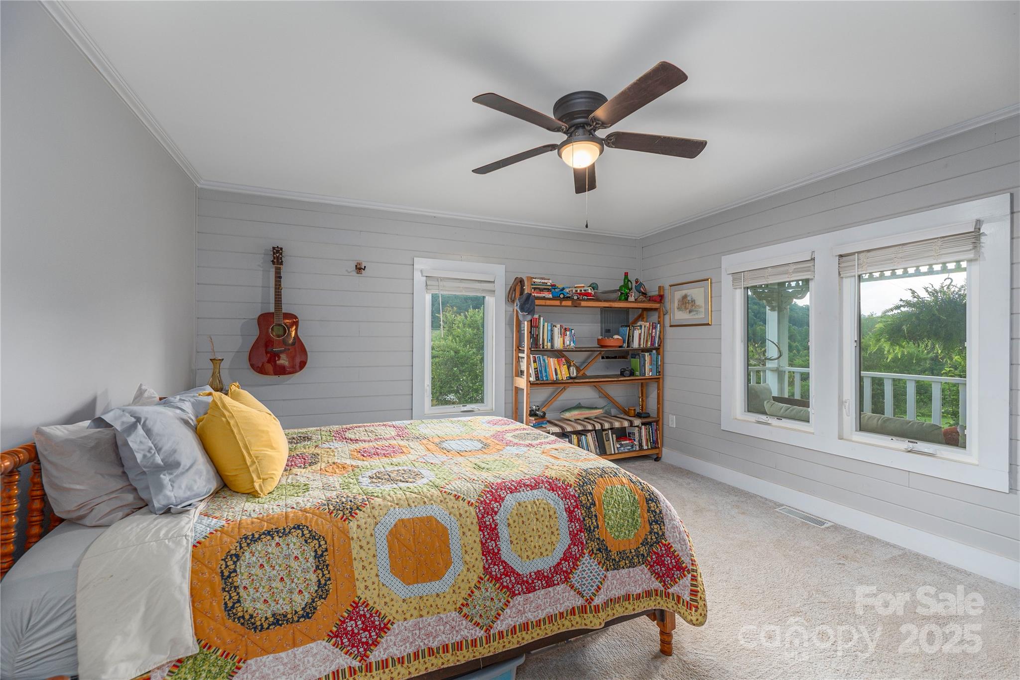 1304 Souther Road Old Fort, NC 28762 - Photo 22 of 48 a bedroom with a bed and window
