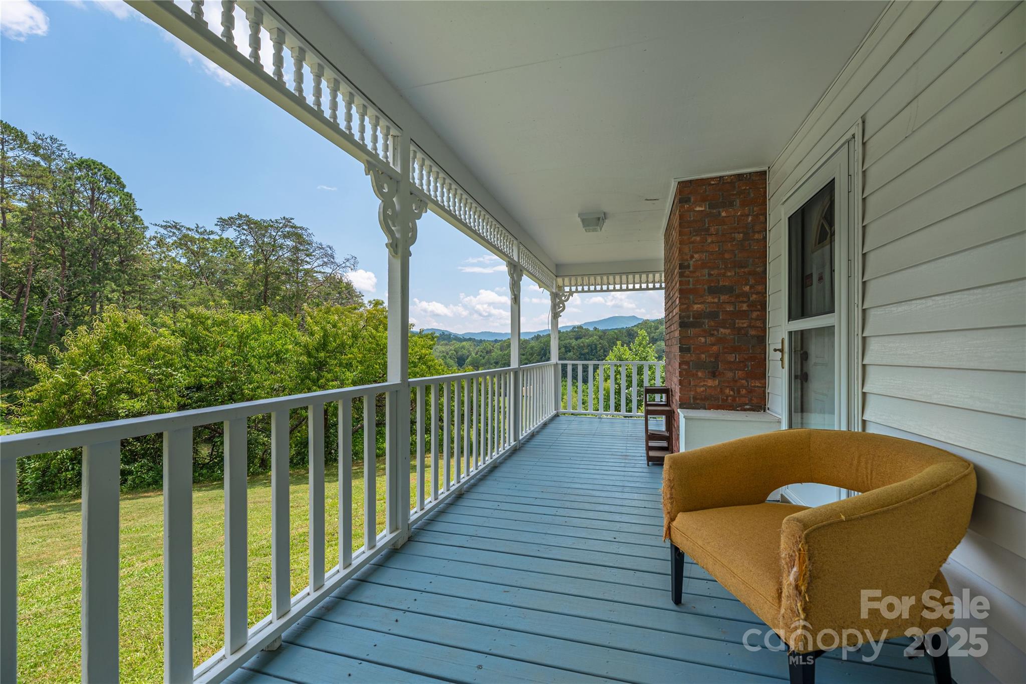 1304 Souther Road Old Fort, NC 28762 - Photo 27 of 48 a balcony with wooden floor and outdoor seating