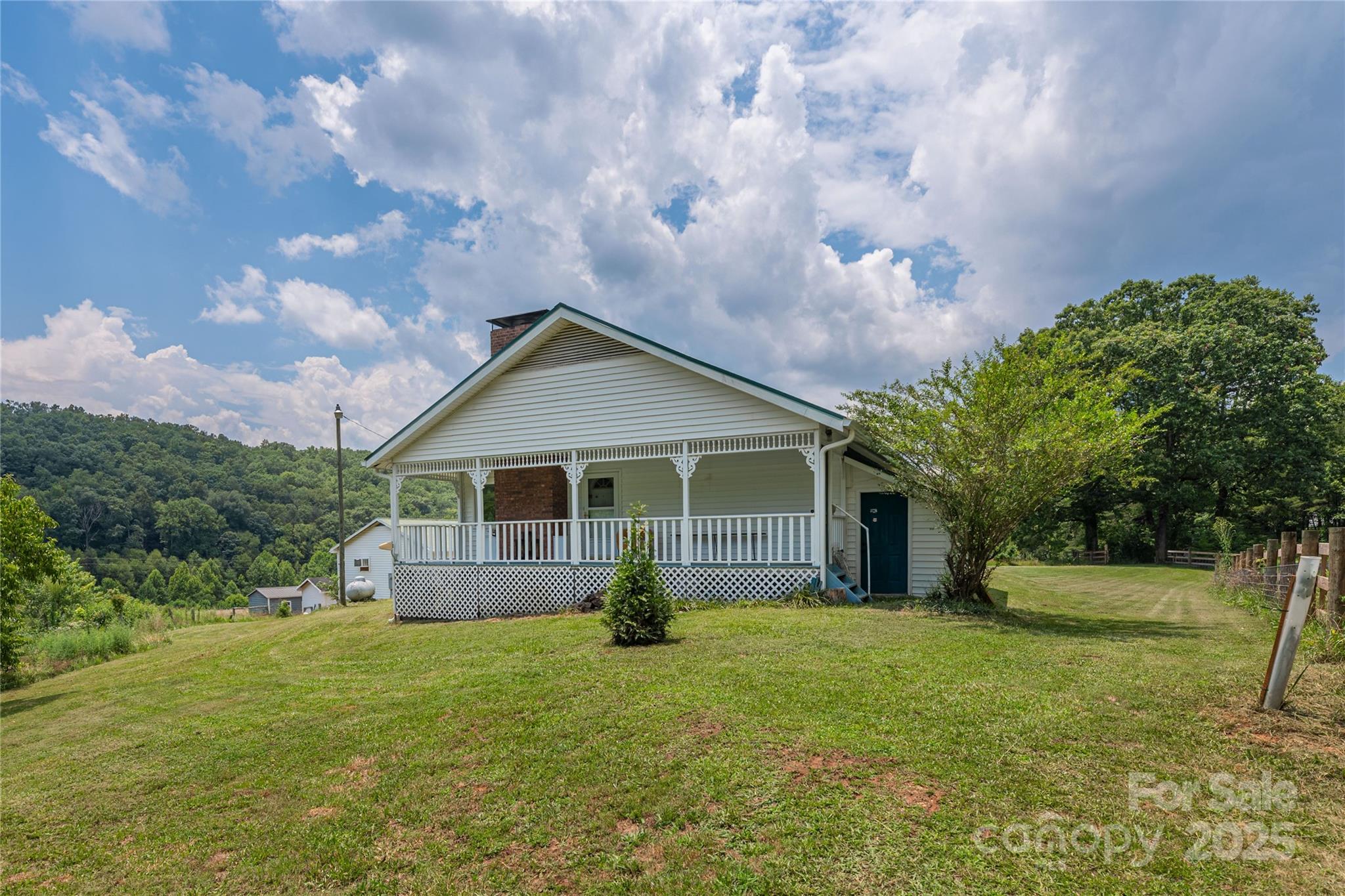 1304 Souther Road Old Fort, NC 28762 - Photo 28 of 48 a front view of house with yard and green space