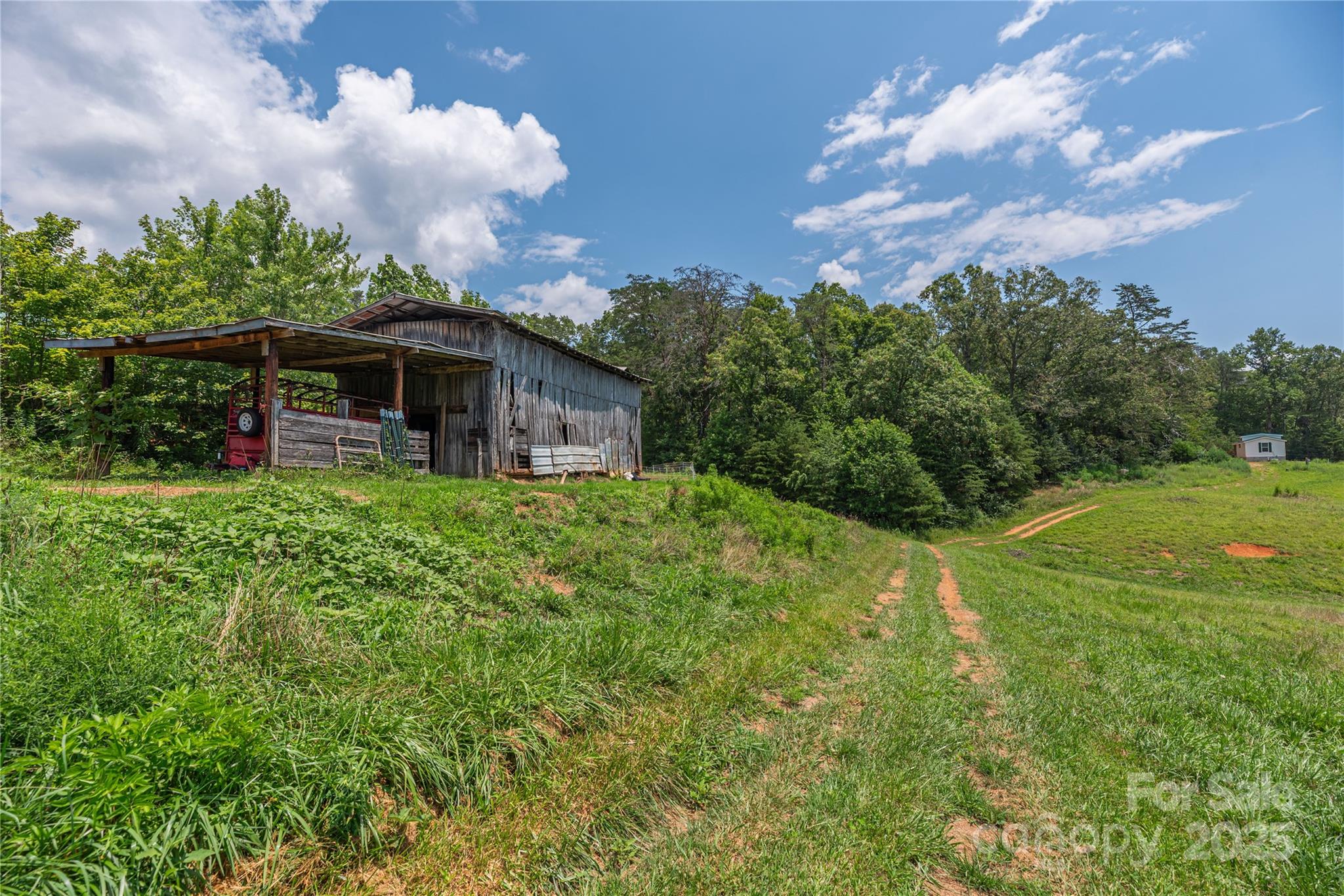 1304 Souther Road Old Fort, NC 28762 - Photo 31 of 48 a view of a house with backyard and garden