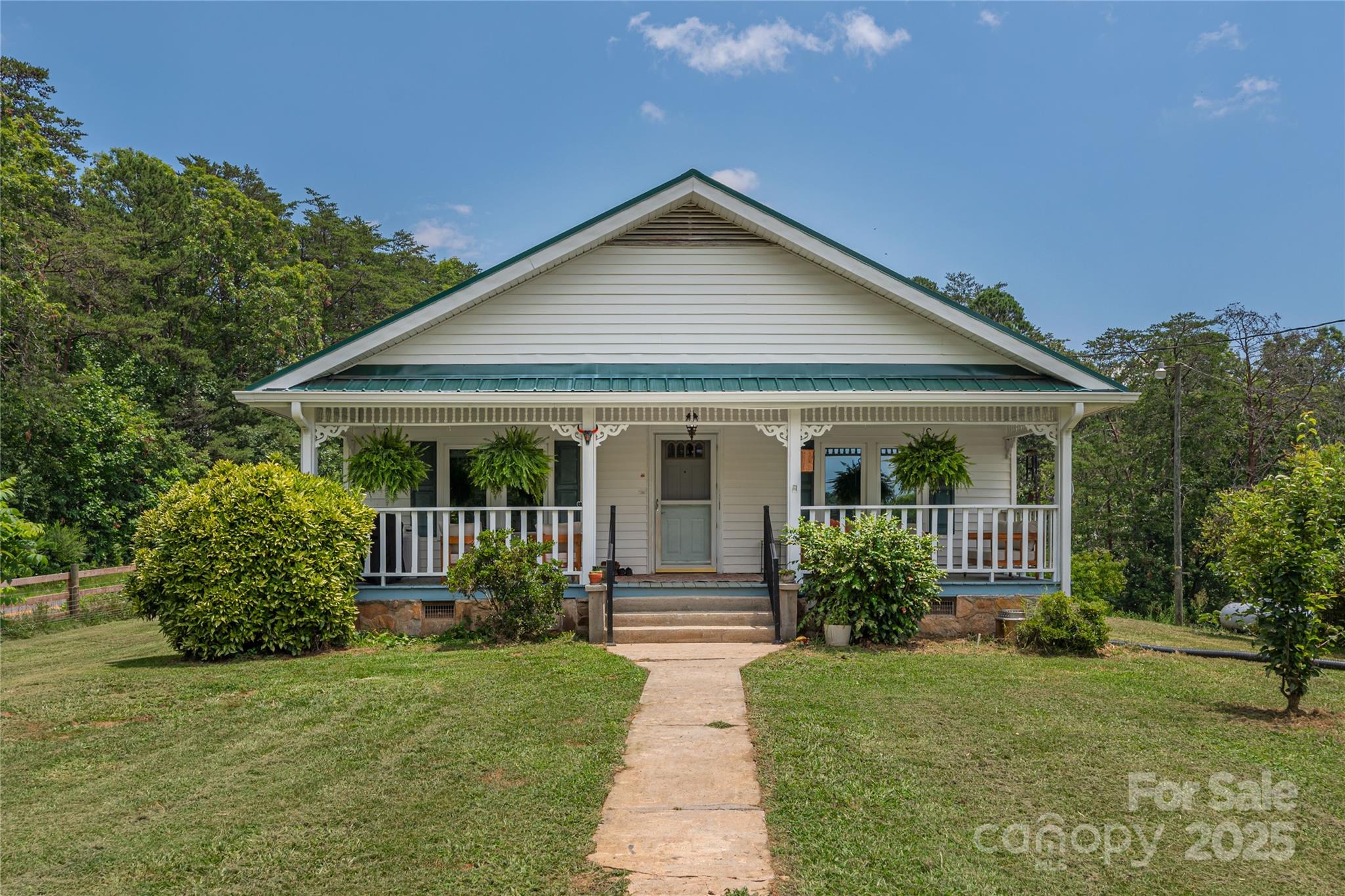 1304 Souther Road Old Fort, NC 28762 - Photo 4 of 48 front view of a house with a yard