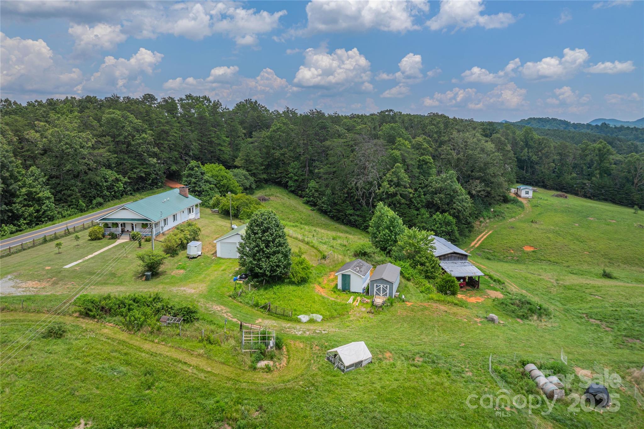 1304 Souther Road Old Fort, NC 28762 - Photo 42 of 48 an aerial view of a house with a yard