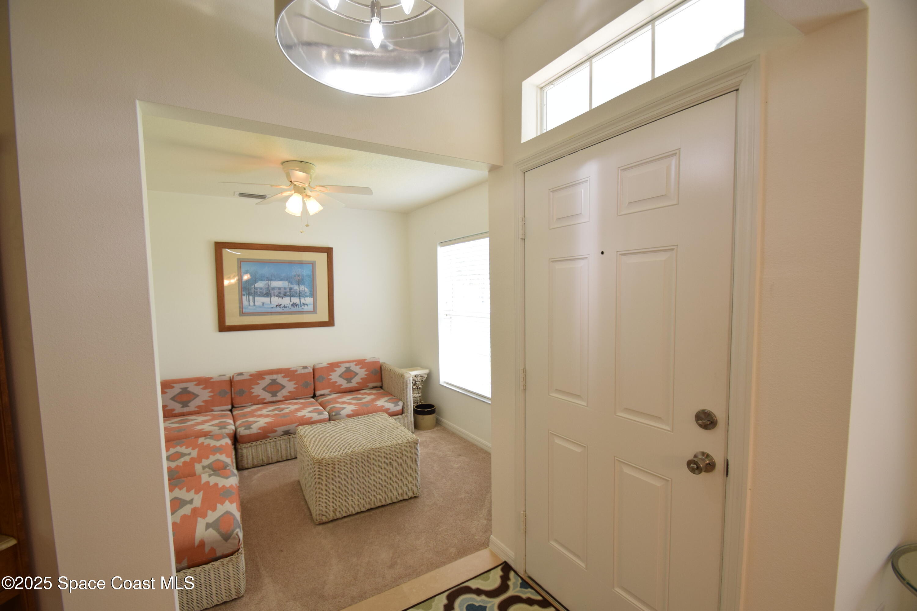 396 Pasto Circle Southwest Palm Bay, FL 32908 - Photo 10 of 75 Flex space - living room