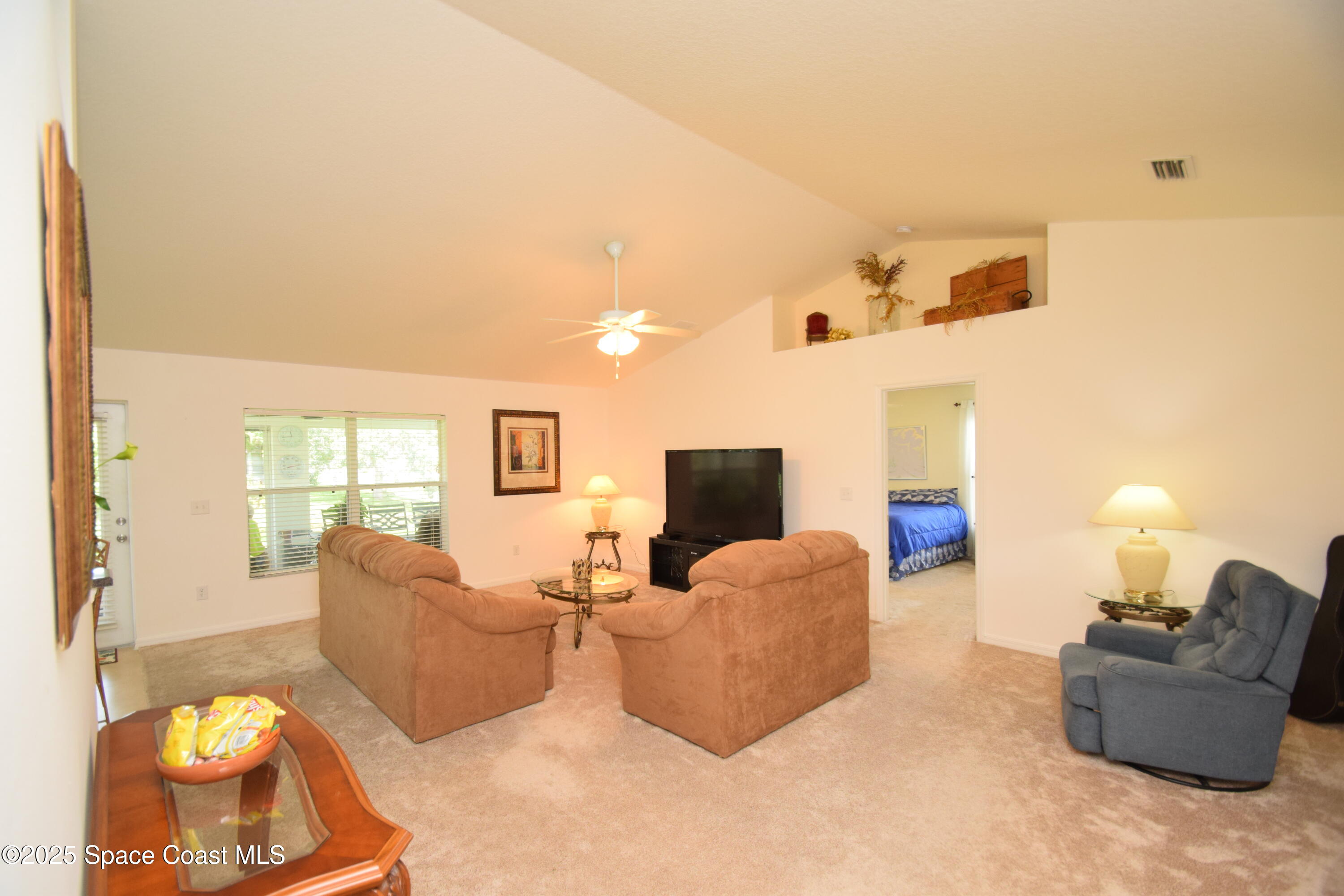 396 Pasto Circle Southwest Palm Bay, FL 32908 - Photo 13 of 75 Family room