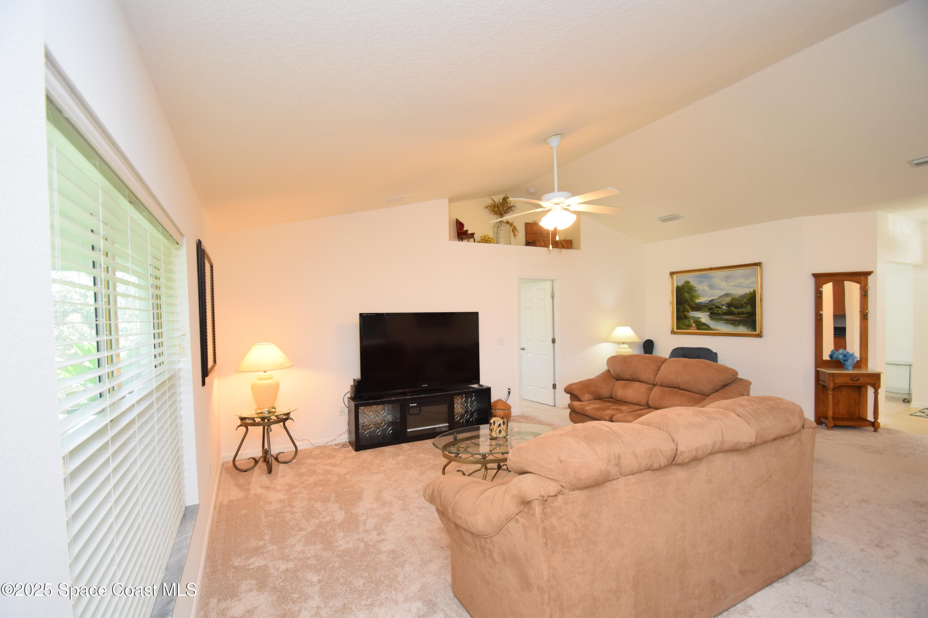 396 Pasto Circle Southwest Palm Bay, FL 32908 - Photo 15 of 75 Family room