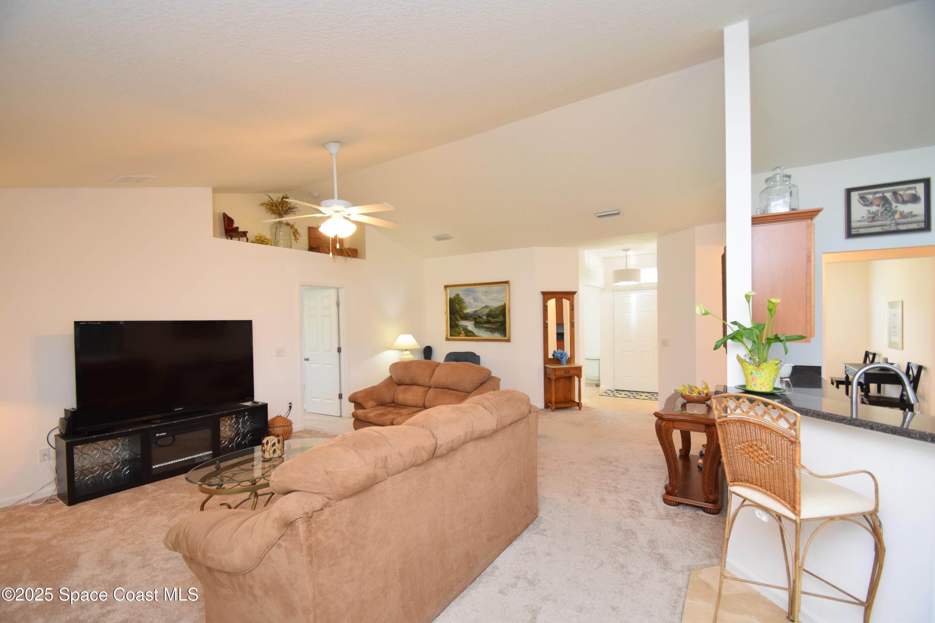 396 Pasto Circle Southwest Palm Bay, FL 32908 - Photo 16 of 75 Family room