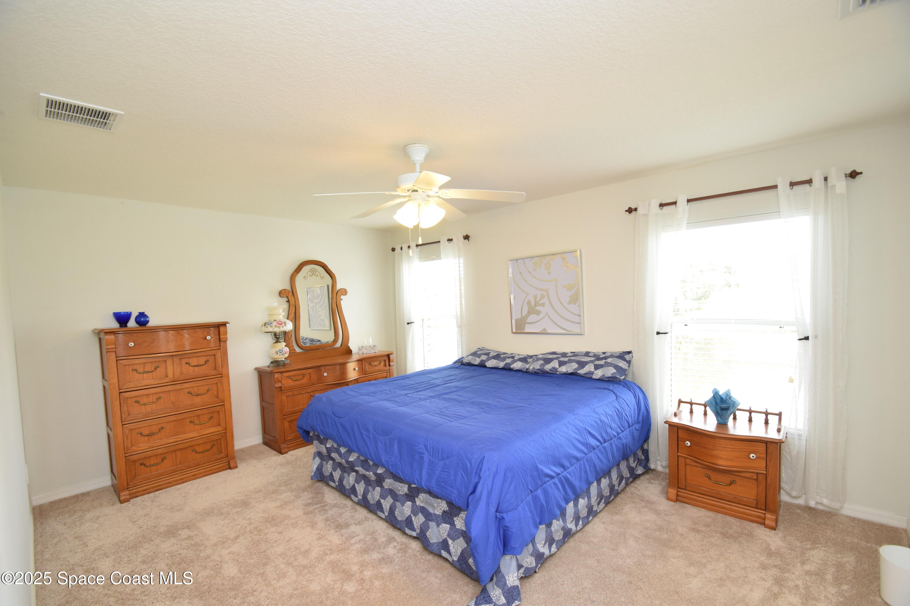396 Pasto Circle Southwest Palm Bay, FL 32908 - Photo 28 of 75 Owner bedroom