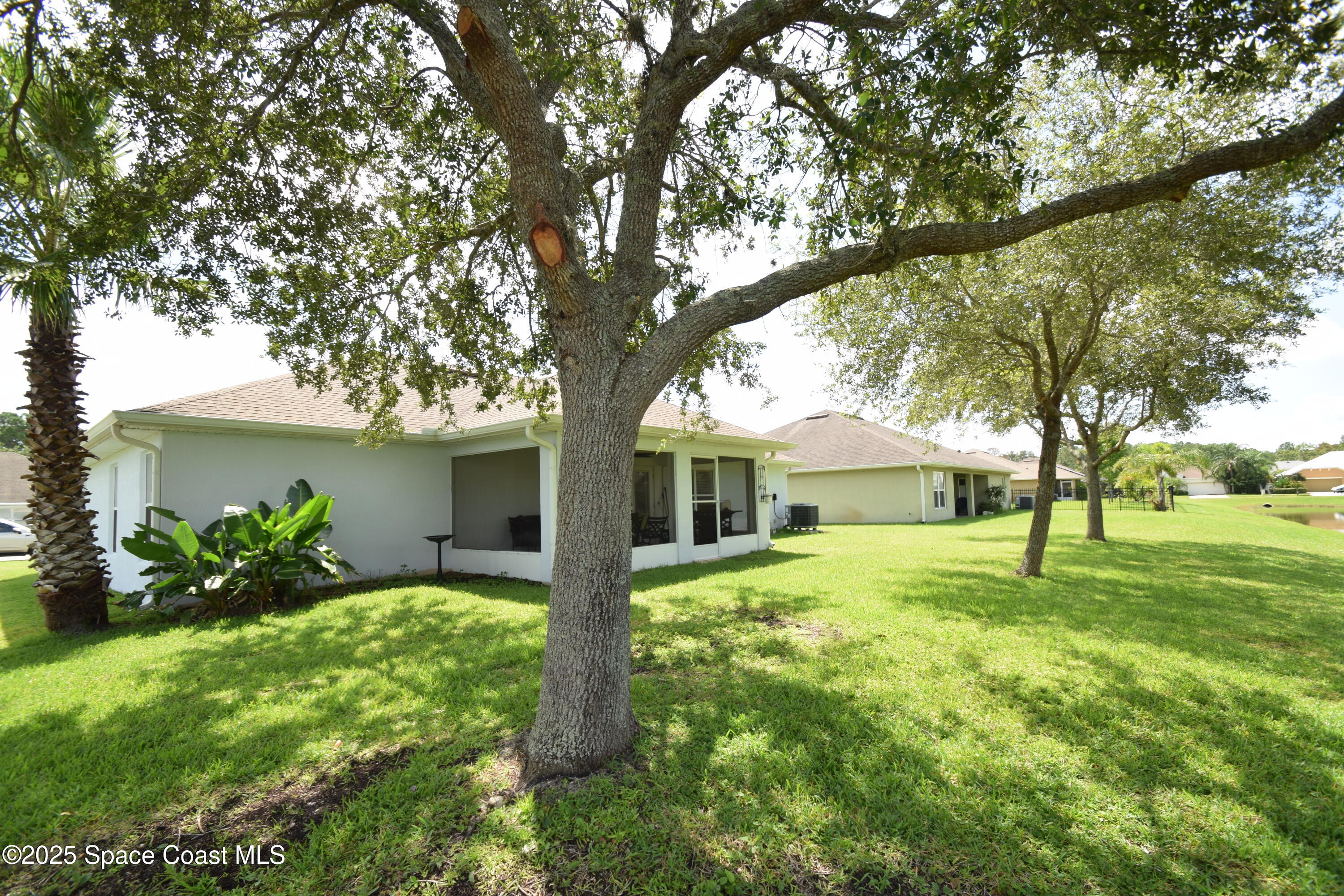 396 Pasto Circle Southwest Palm Bay, FL 32908 - Photo 2 of 75 Rear View