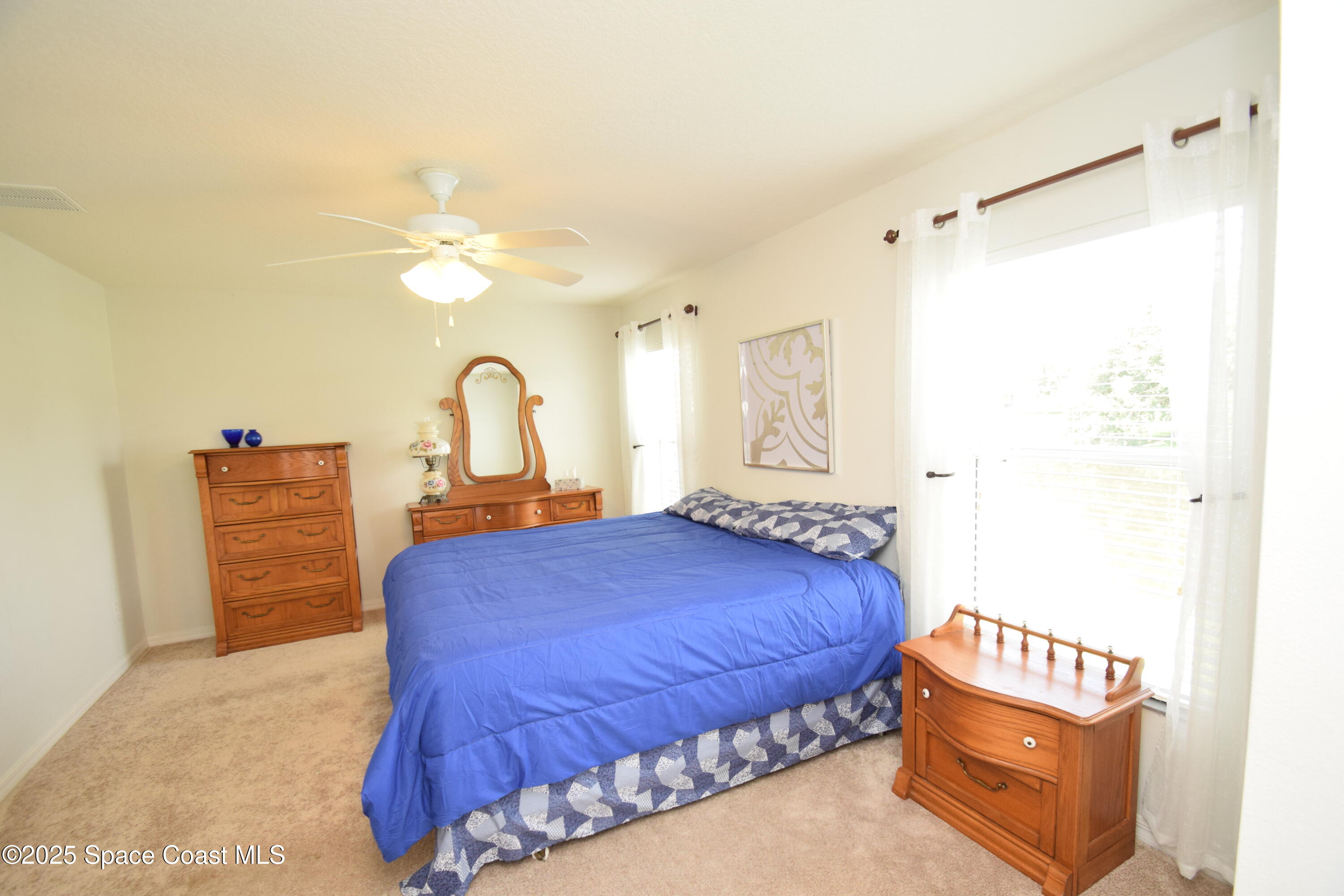 396 Pasto Circle Southwest Palm Bay, FL 32908 - Photo 39 of 75 Owner bedroom