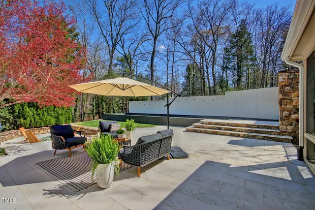 front view of a house with a garden