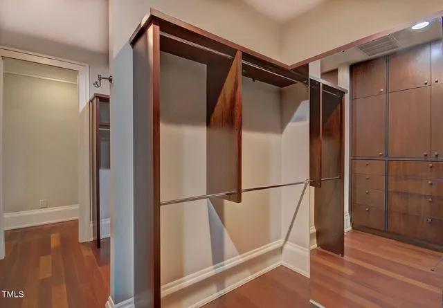 a spacious bathroom with a granite countertop sink