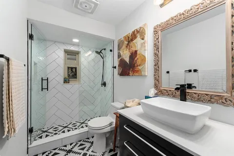 a view of storage and utility room with washer and dryer