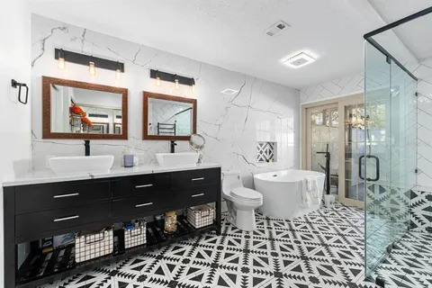 a bed room with a bed and a couch