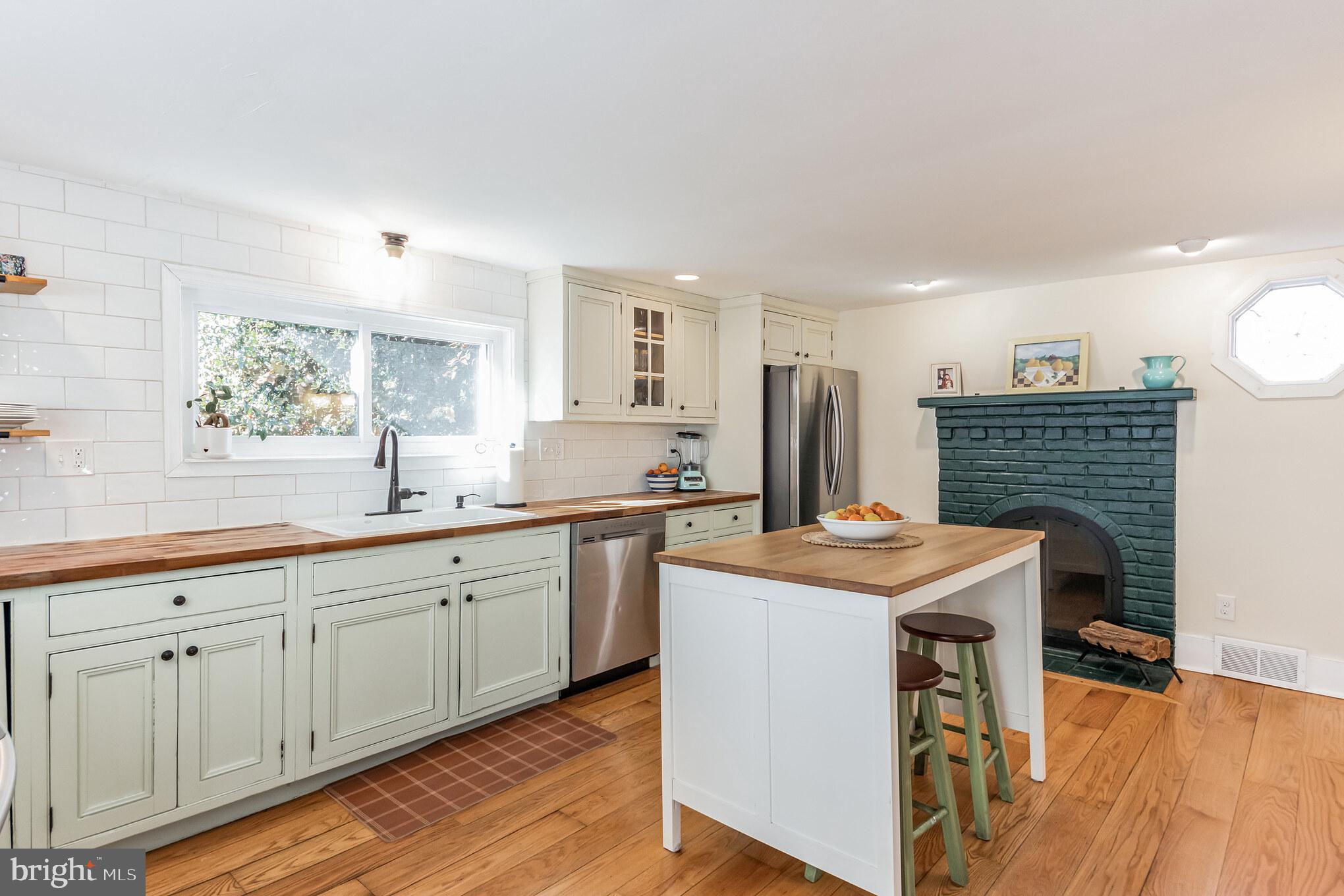 1824 Forest Grove Road Furlong, PA 18925 - Photo 8 of 29 Renovated kitchen with wood burning fireplace