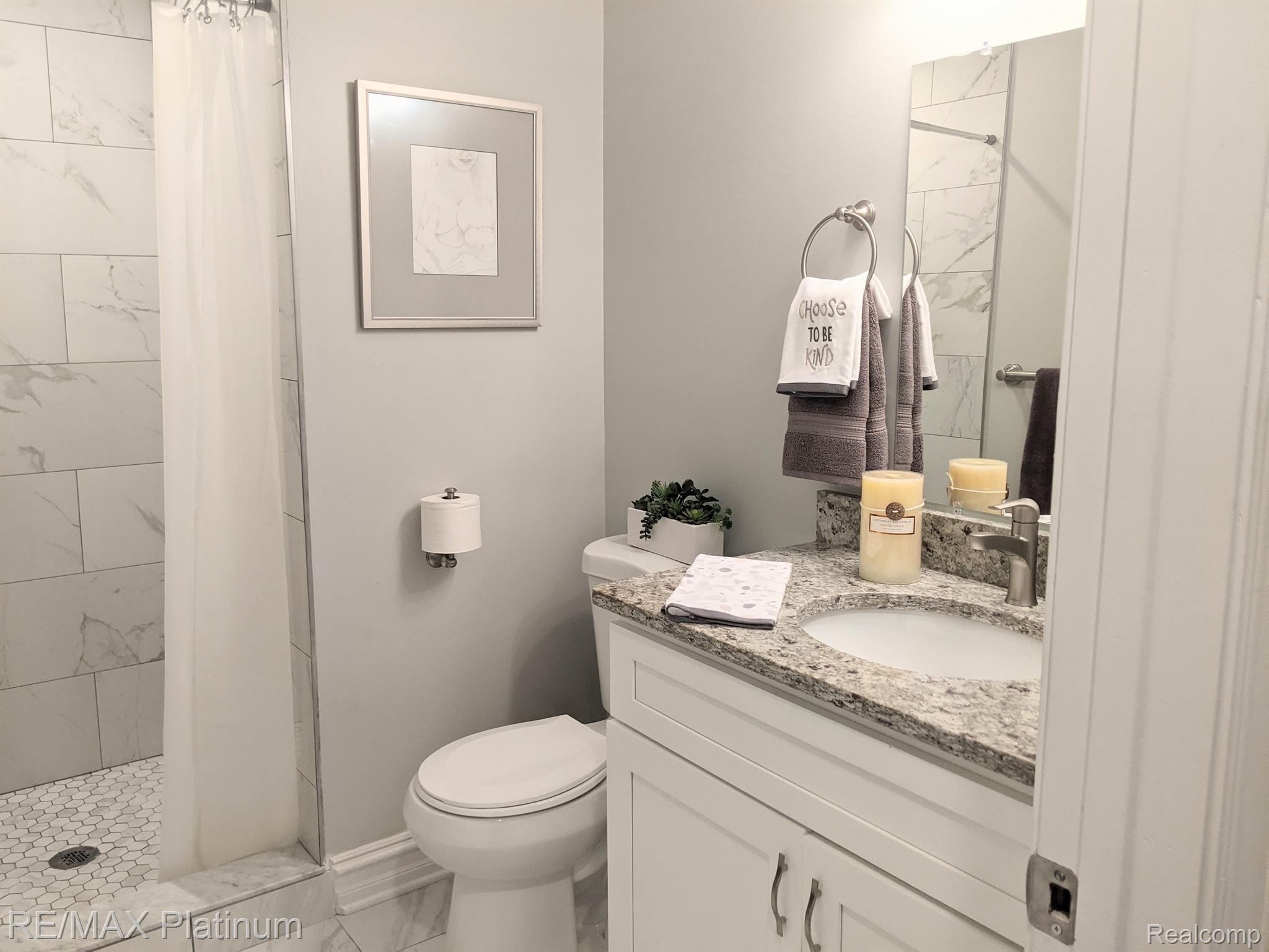 810 Chelsea Ridge Court, Unit 21 Howell, MI 48843 - Photo 33 of 43 Peeking into main bath