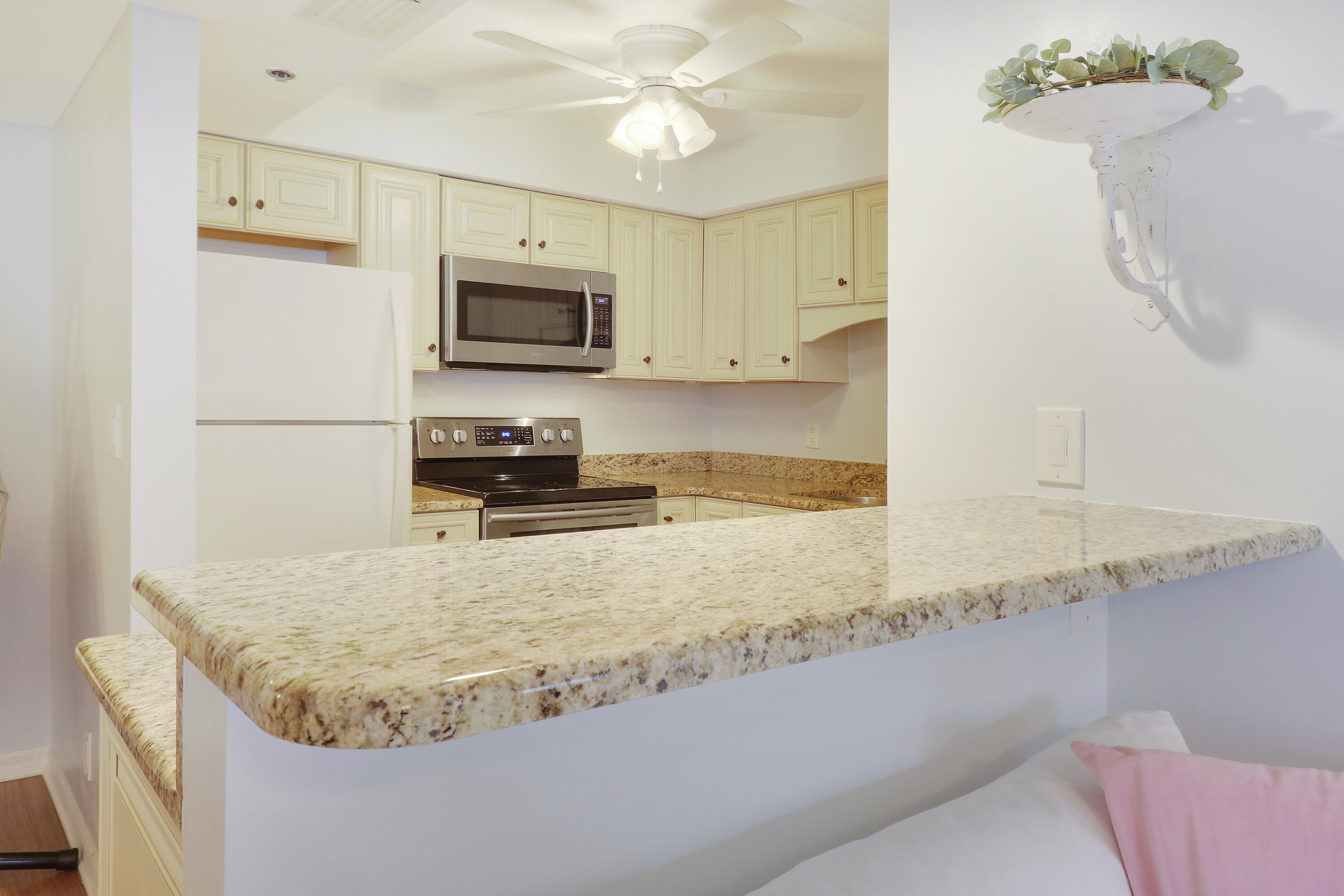 950 South Kanner Highway, Unit E2 Stuart, FL 34994 - Photo 15 of 37 Kitchen with Granite Countertops
