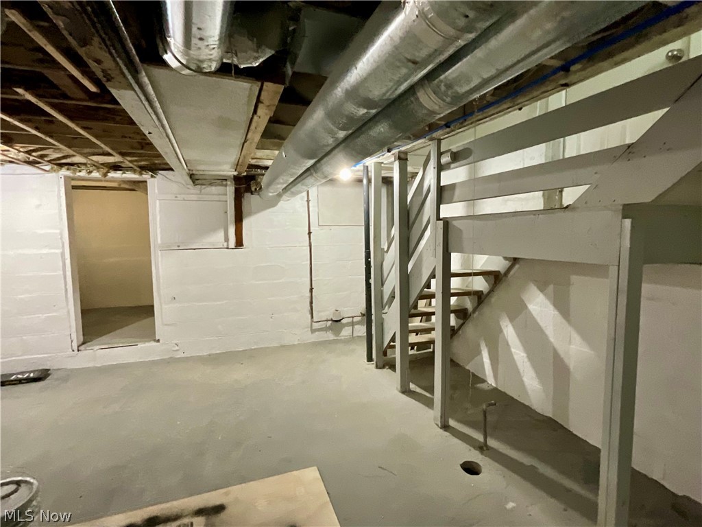 425 Spaulding Street Akron, OH 44310 - Photo 14 of 17 Unfinished below grade area featuring stairway