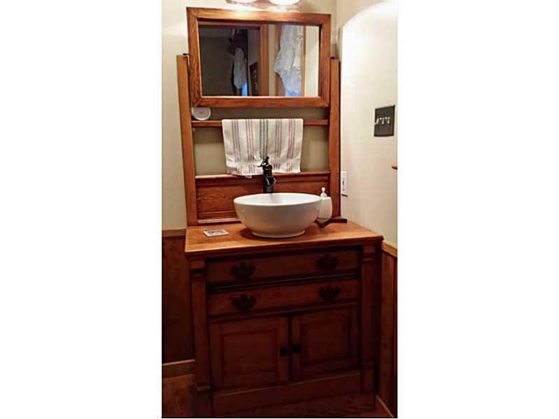 279 Alwine Road Boswell, PA 15531 - Photo 12 of 25 Master Bath/Spa. Master bath antique sink vanity with vessel sink.