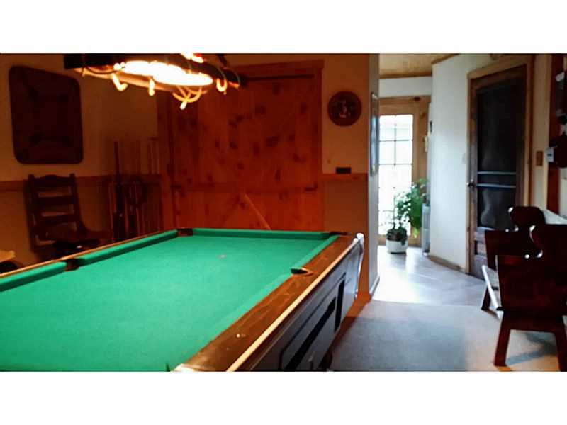 279 Alwine Road Boswell, PA 15531 - Photo 20 of 25 Den/Family/Great Room. Game room with pool table that stays. Storage closet finished with barn wood.