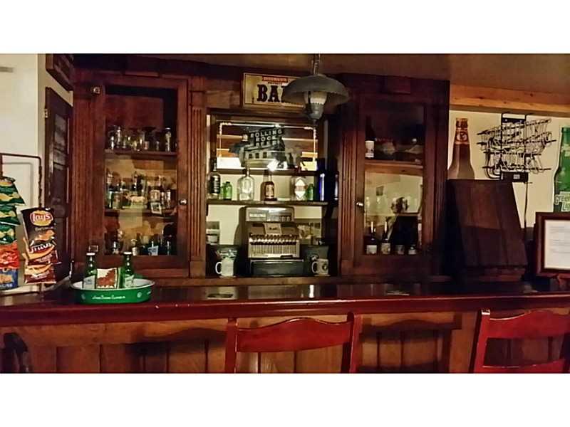 279 Alwine Road Boswell, PA 15531 - Photo 23 of 25 Family Room. A gem in this home! A reclaimed bar and bar back from a local establishment adds so much character and fun!