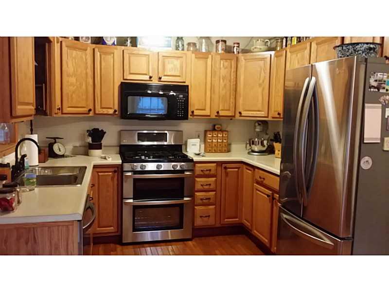 279 Alwine Road Boswell, PA 15531 - Photo 7 of 25 Kitchen. Stainless appliances, oak floor, new countertop and a custom breakfast island.