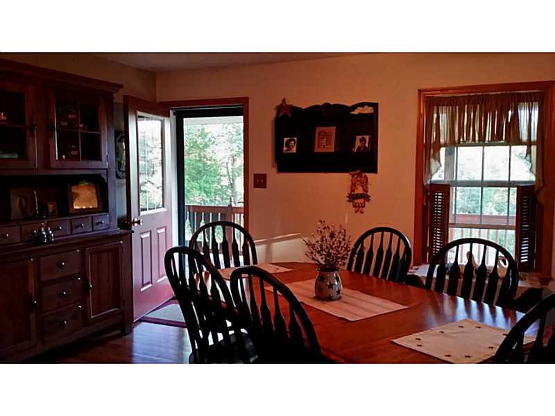 279 Alwine Road Boswell, PA 15531 - Photo 10 of 25 Dining Room. Dining room walks out to covered front porch for added entertaining space.