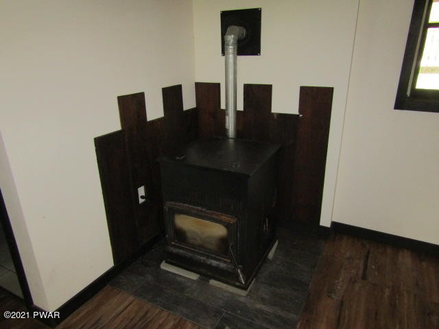 104 Daniels Road Hawley, PA 18428 - Photo 26 of 37 Pellet Stove in Family Room