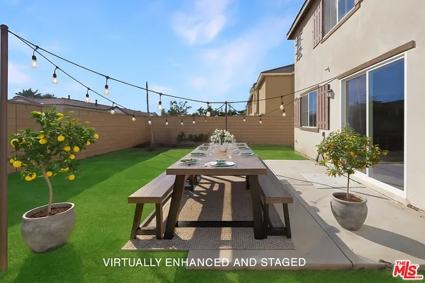 a view of swimming pool with a yard