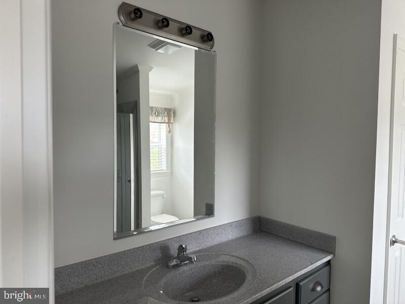 65 Ash Road Hamburg, PA 19526 - Photo 13 of 18 a bathroom with a sink and a mirror
