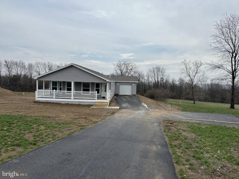 65 Ash Road Hamburg, PA 19526 - Photo 2 of 18 a front view of a house with a yard