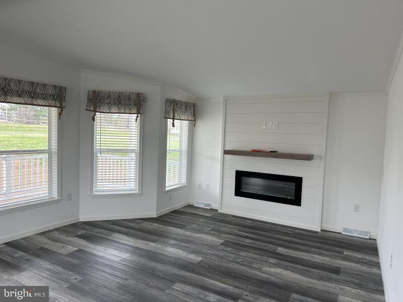 65 Ash Road Hamburg, PA 19526 - Photo 9 of 18 a view of an empty room with a fireplace and a window