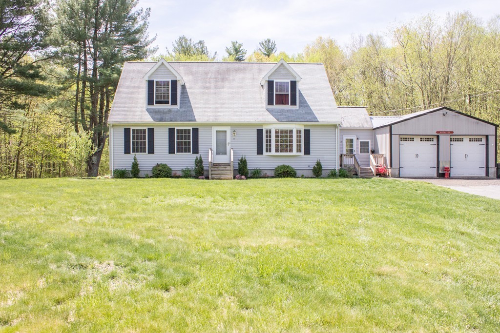 49 Duval Road Sutton, MA 01590 - Photo 3 of 27 a view of house with yard