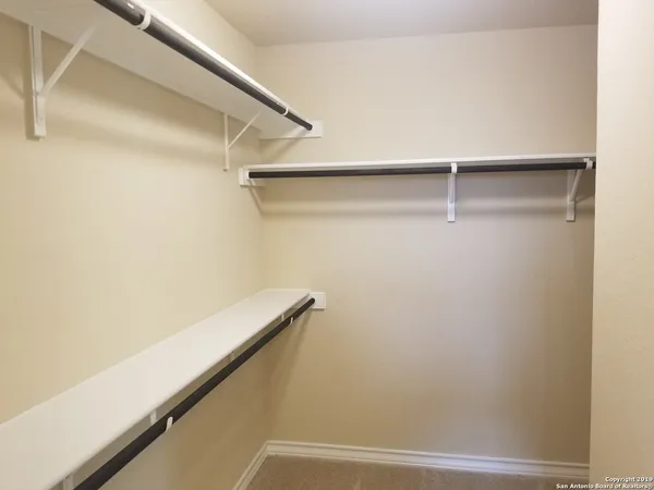 a view of small space with racks on the wall