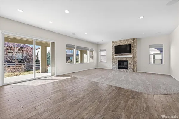 a view of livingroom with furniture wooden floor and window