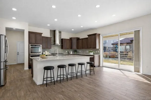 a large kitchen with lots of counter space and appliances