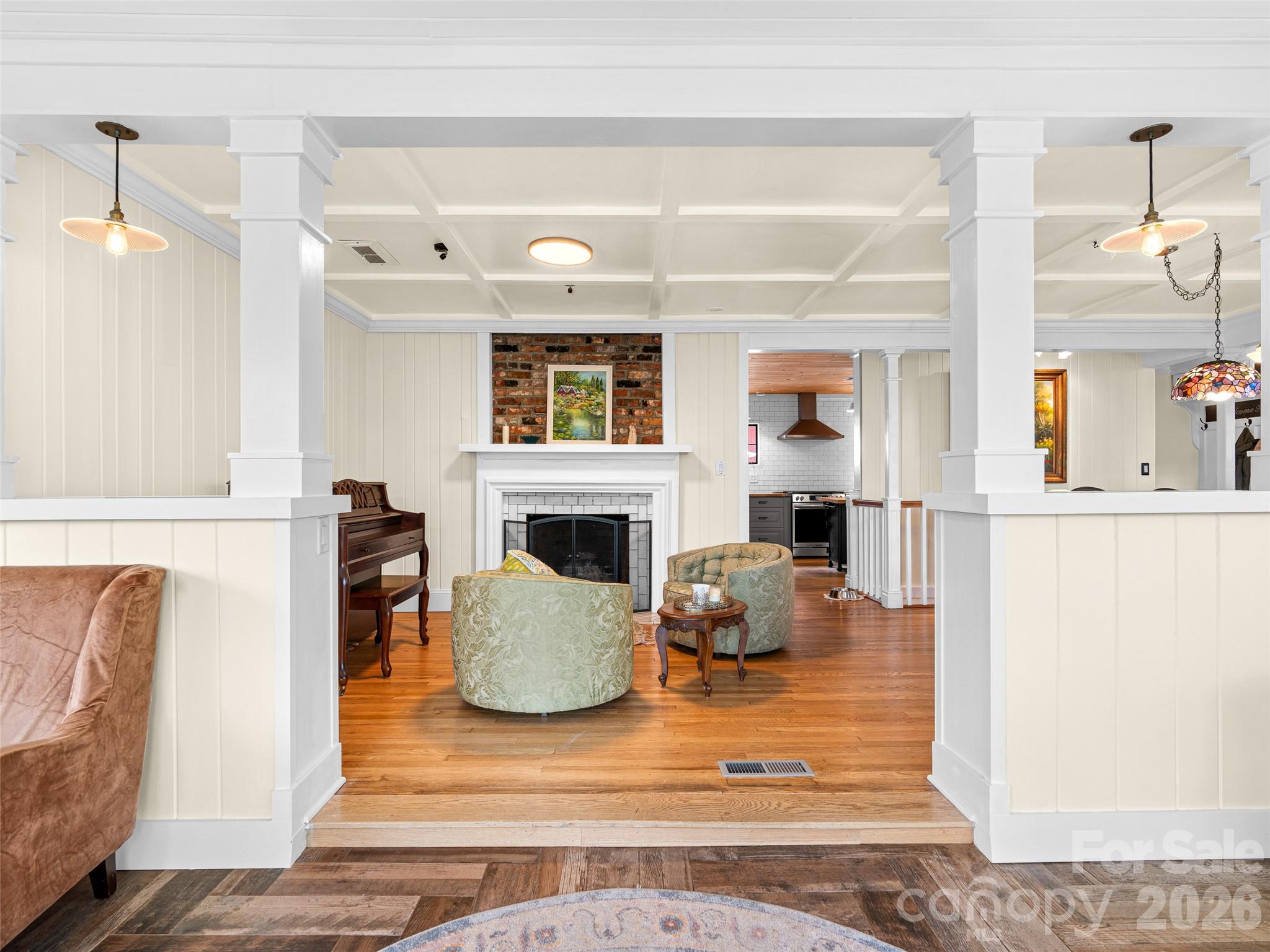 686 New Haw Creek Road Asheville, NC 28805 - Photo 13 of 47 a view of living room with furniture and a fireplace