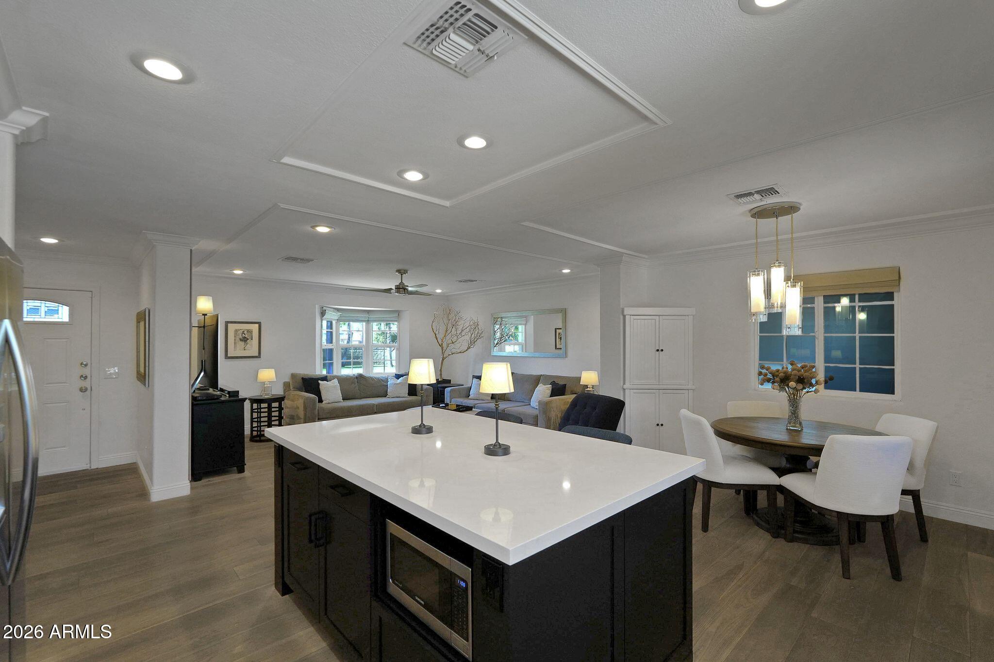 5019 North 2nd Street Phoenix, AZ 85012 - Photo 12 of 30 a large kitchen with a table and chairs