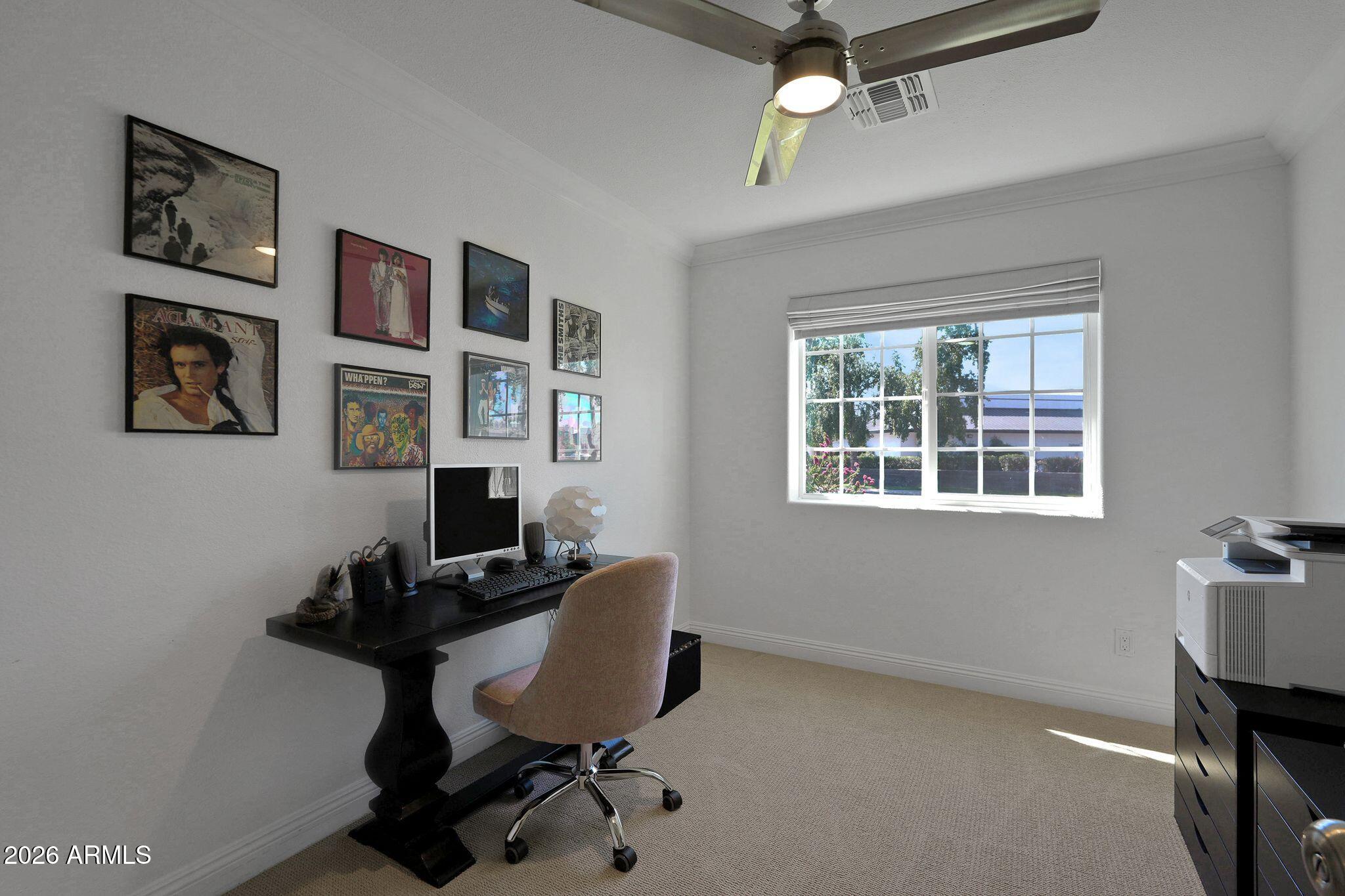 5019 North 2nd Street Phoenix, AZ 85012 - Photo 20 of 30 a view of a workspace with furniture and a window