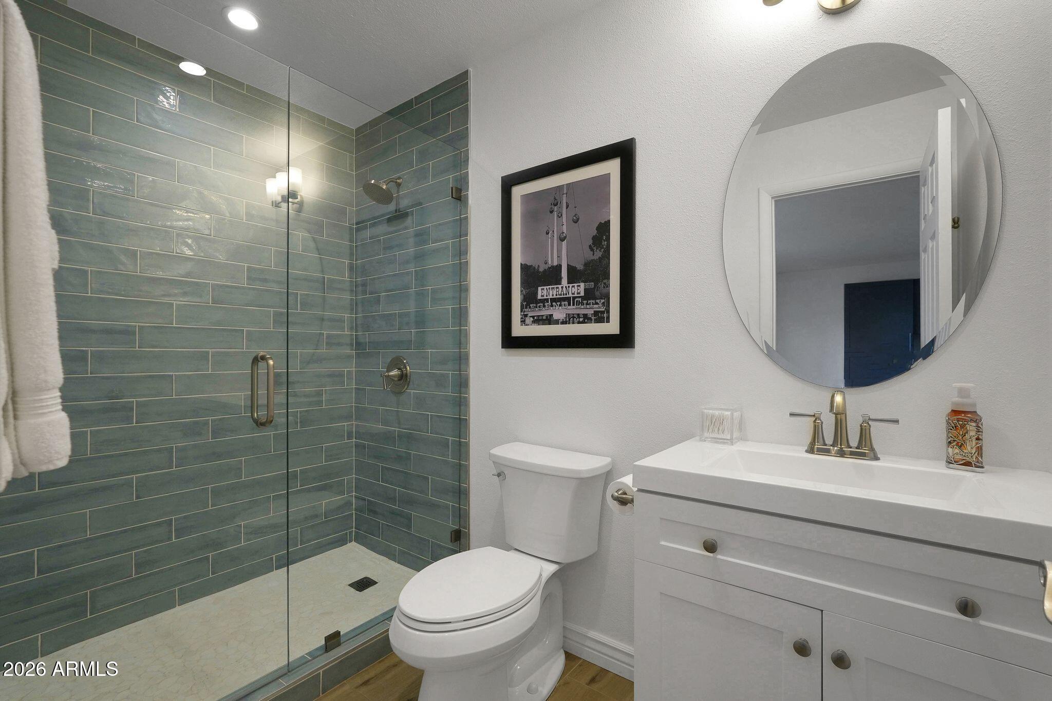 5019 North 2nd Street Phoenix, AZ 85012 - Photo 26 of 30 a bathroom with a toilet sink and shower