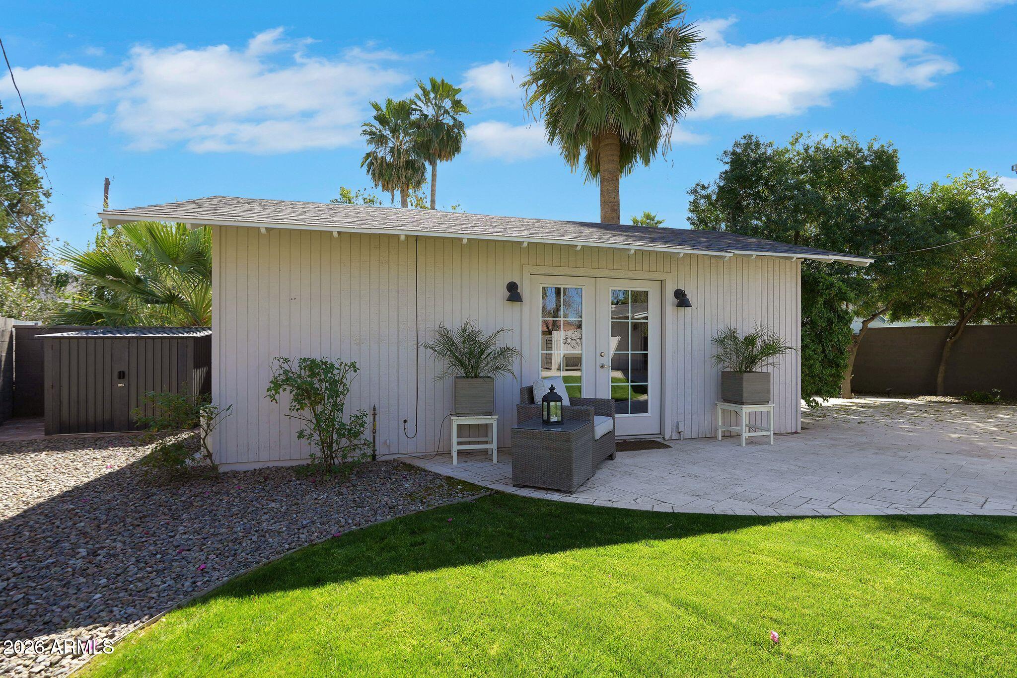 5019 North 2nd Street Phoenix, AZ 85012 - Photo 6 of 30 a view of a house with backyard and a tree