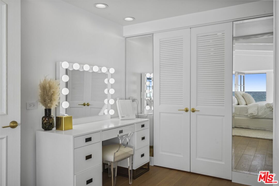 31500 Victoria Point Road Malibu, CA 90265 - Photo 29 of 53 a bathroom with a sink vanity and mirror