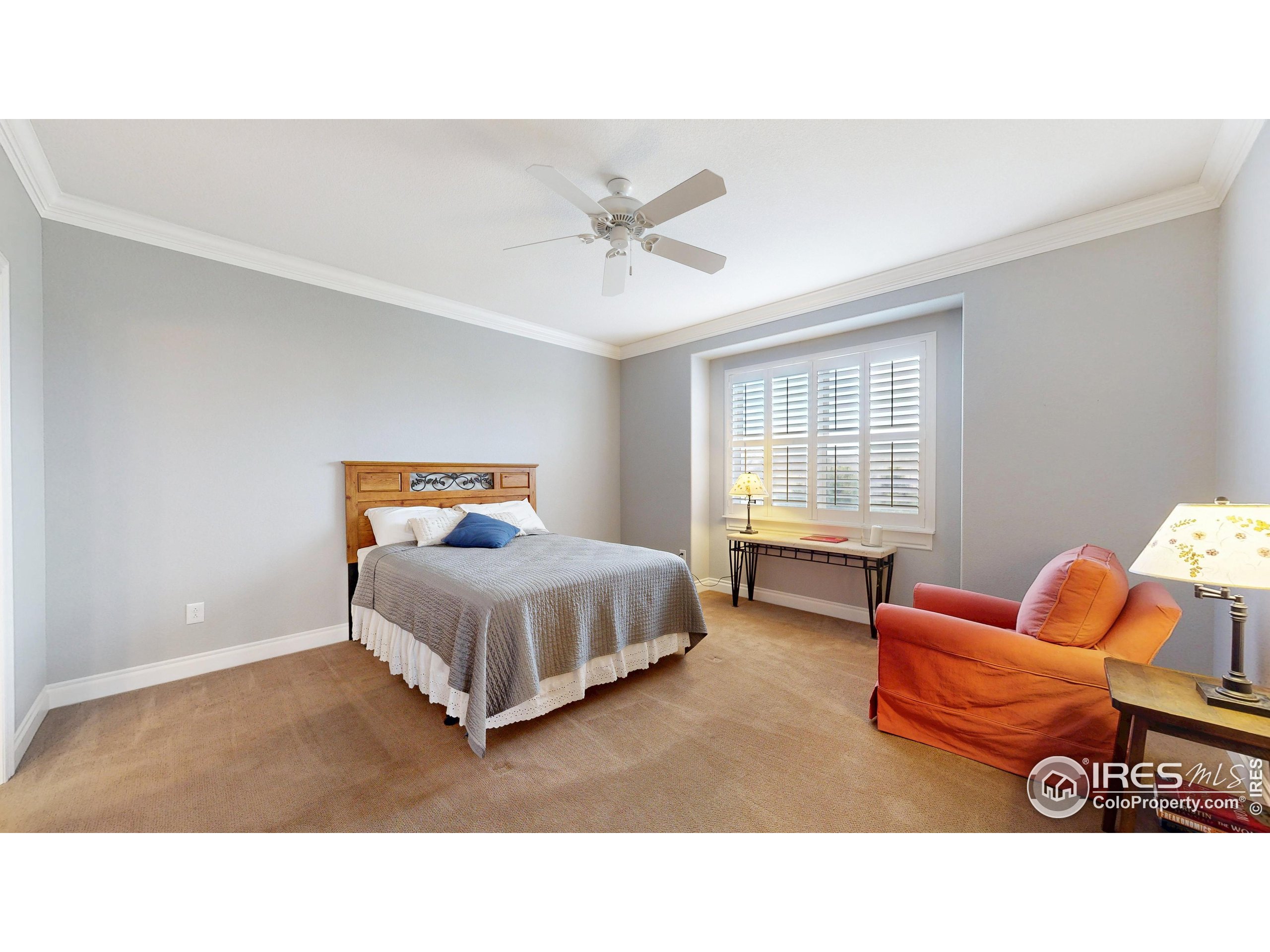 3602 Doral Place Longmont, CO 80503 - Photo 13 of 40 a living room with furniture and a window