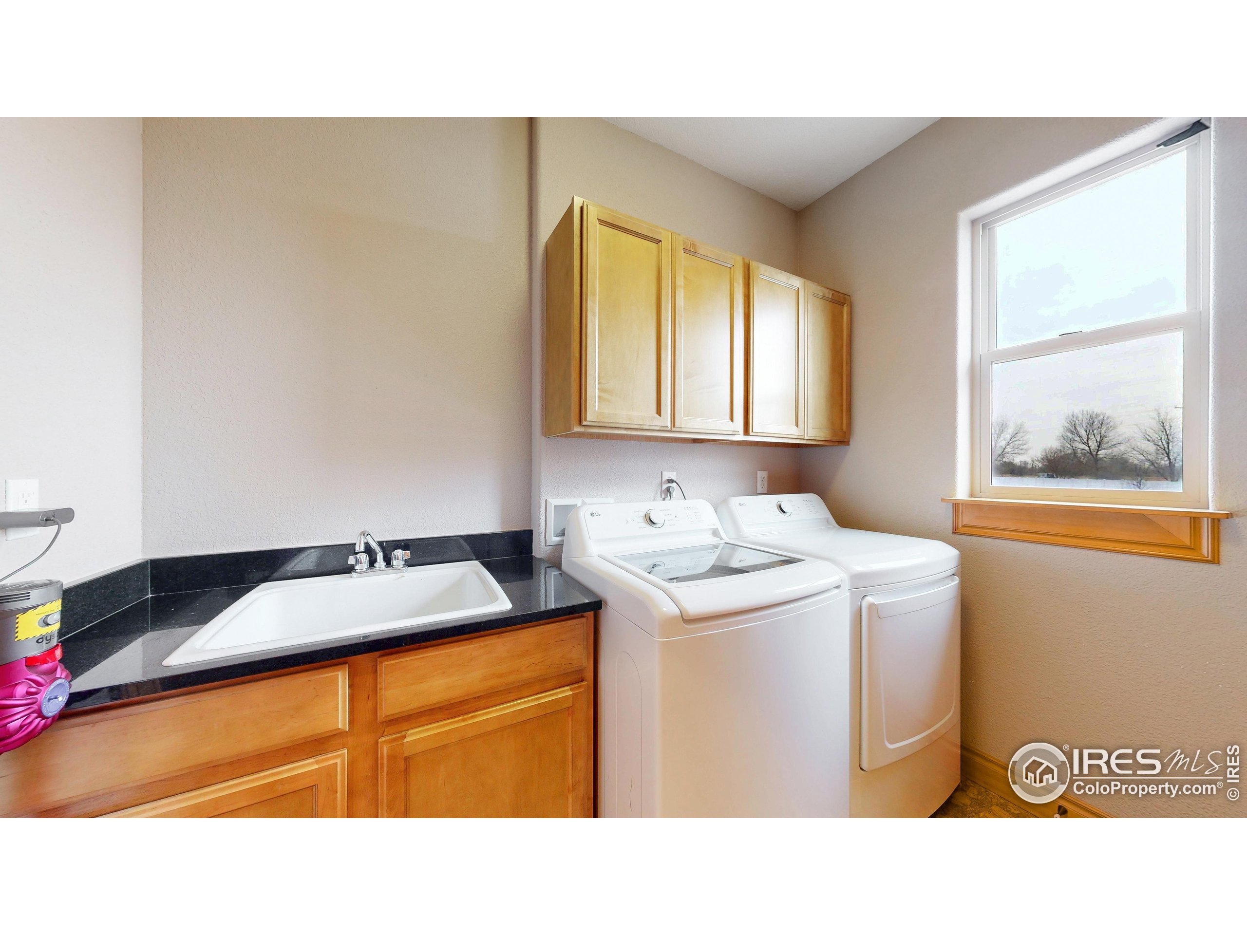 3602 Doral Place Longmont, CO 80503 - Photo 24 of 40 a bathroom with a sink and a mirror