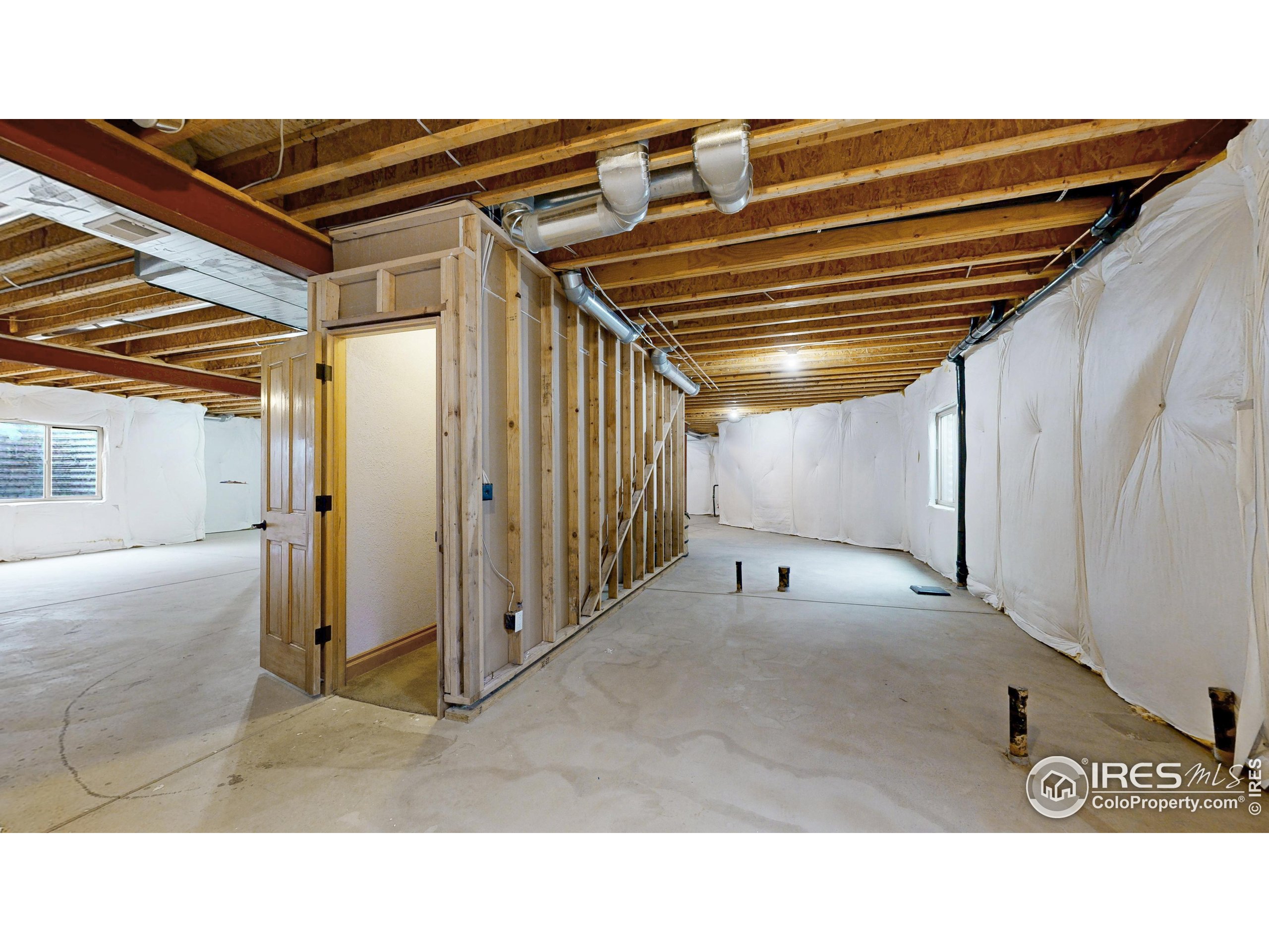 3602 Doral Place Longmont, CO 80503 - Photo 25 of 40 a black and white photo of a big room