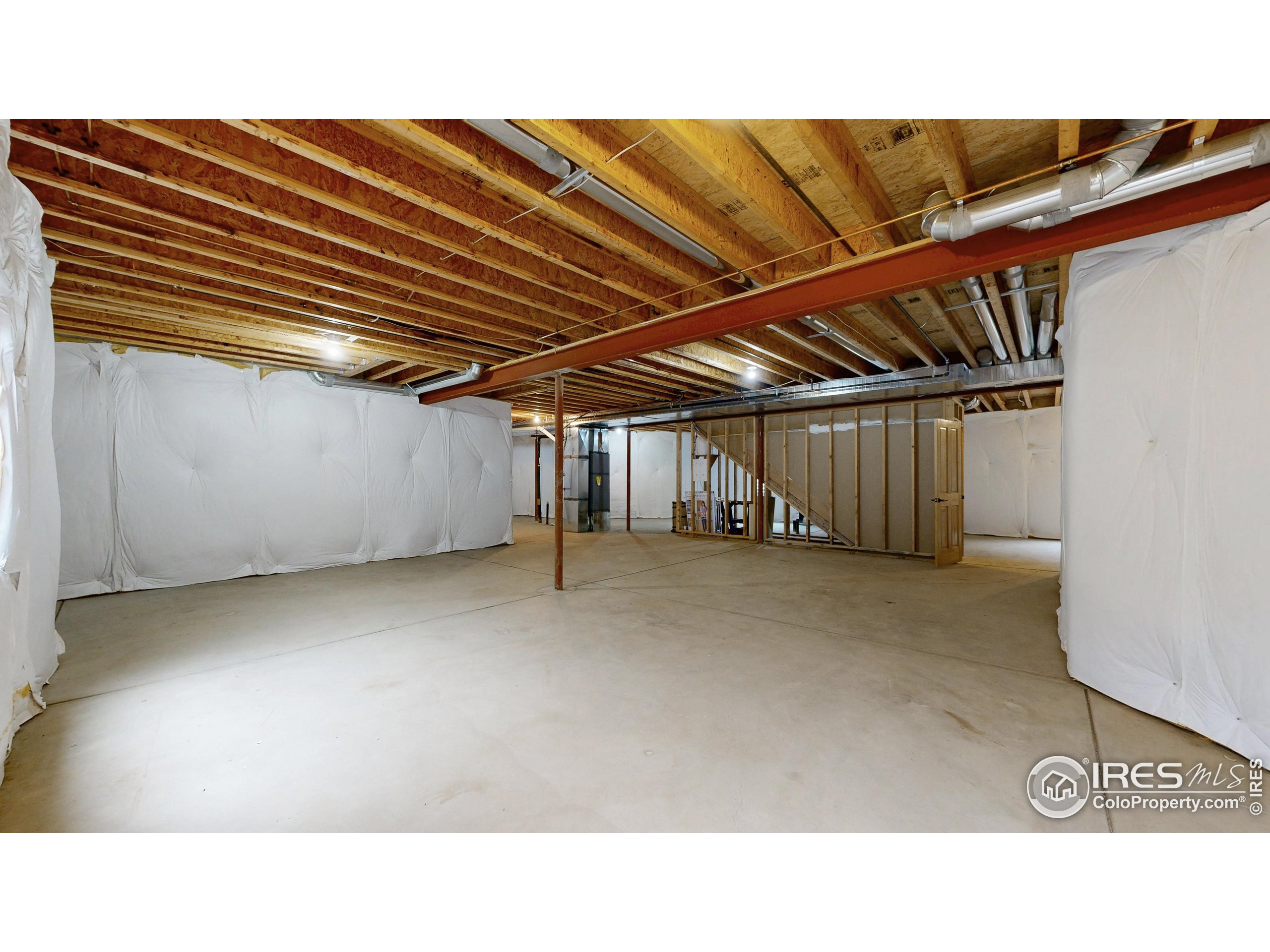 3602 Doral Place Longmont, CO 80503 - Photo 27 of 40 a black and white photo of a big room