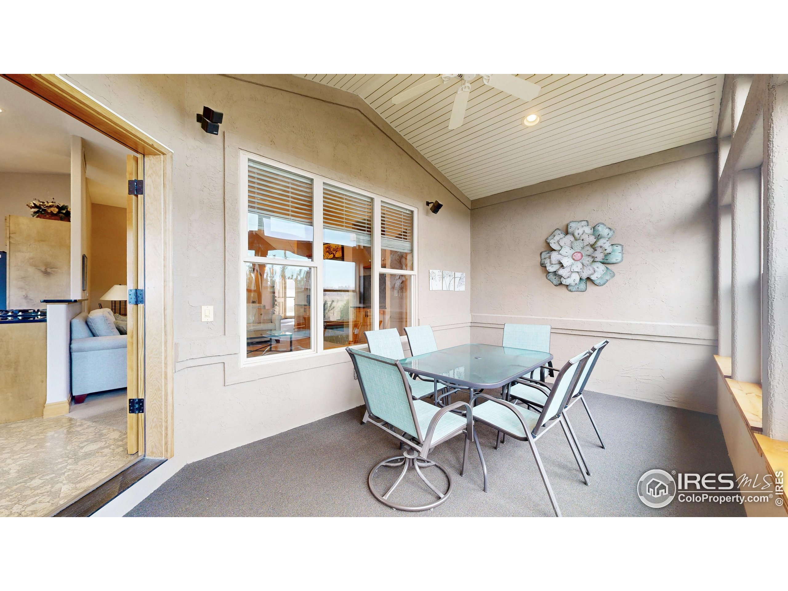 3602 Doral Place Longmont, CO 80503 - Photo 28 of 40 a dining room with furniture and window