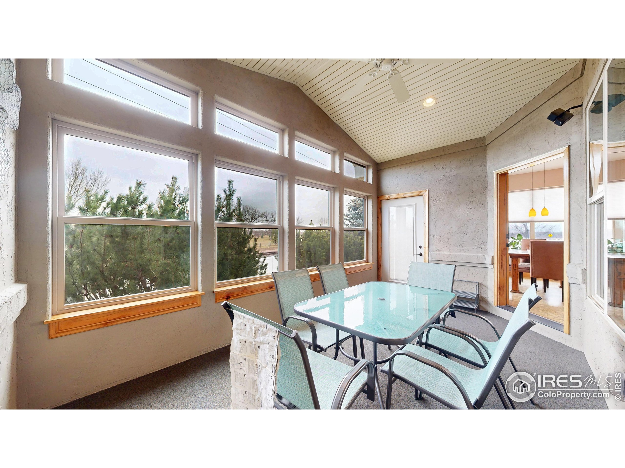 3602 Doral Place Longmont, CO 80503 - Photo 30 of 40 a living room with furniture and a large window