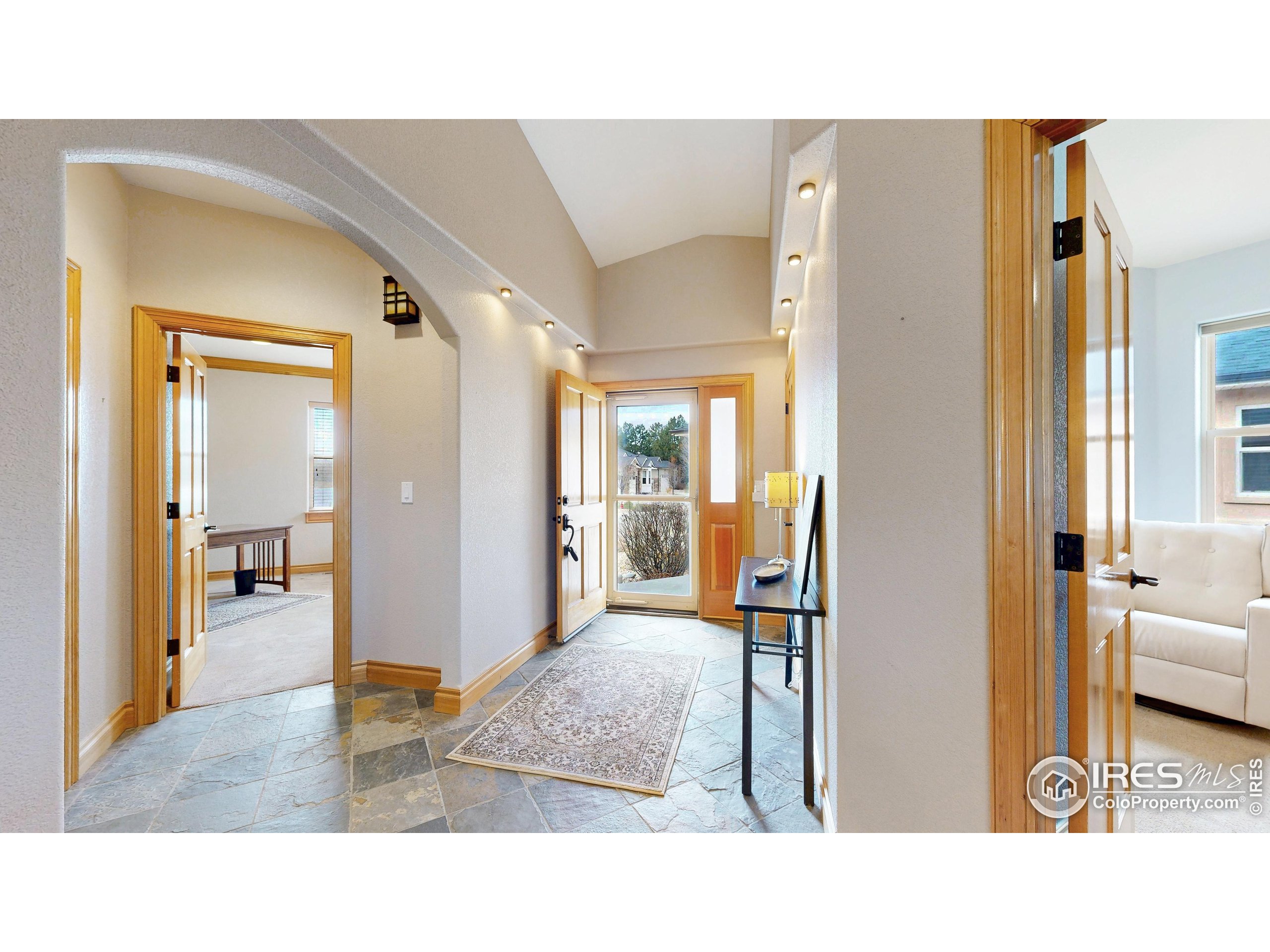 3602 Doral Place Longmont, CO 80503 - Photo 3 of 40 a bathroom with a tub and shower