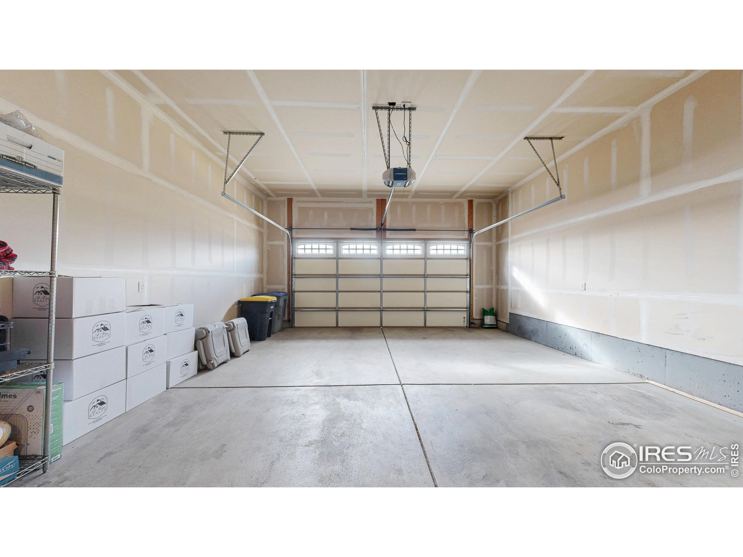 3602 Doral Place Longmont, CO 80503 - Photo 31 of 40 a black and white photo of a living room