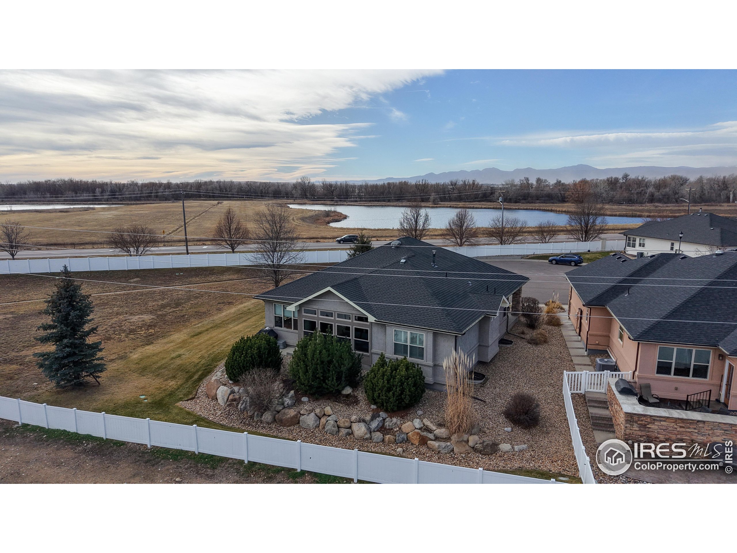 3602 Doral Place Longmont, CO 80503 - Photo 34 of 40 a view of a city with an ocean view